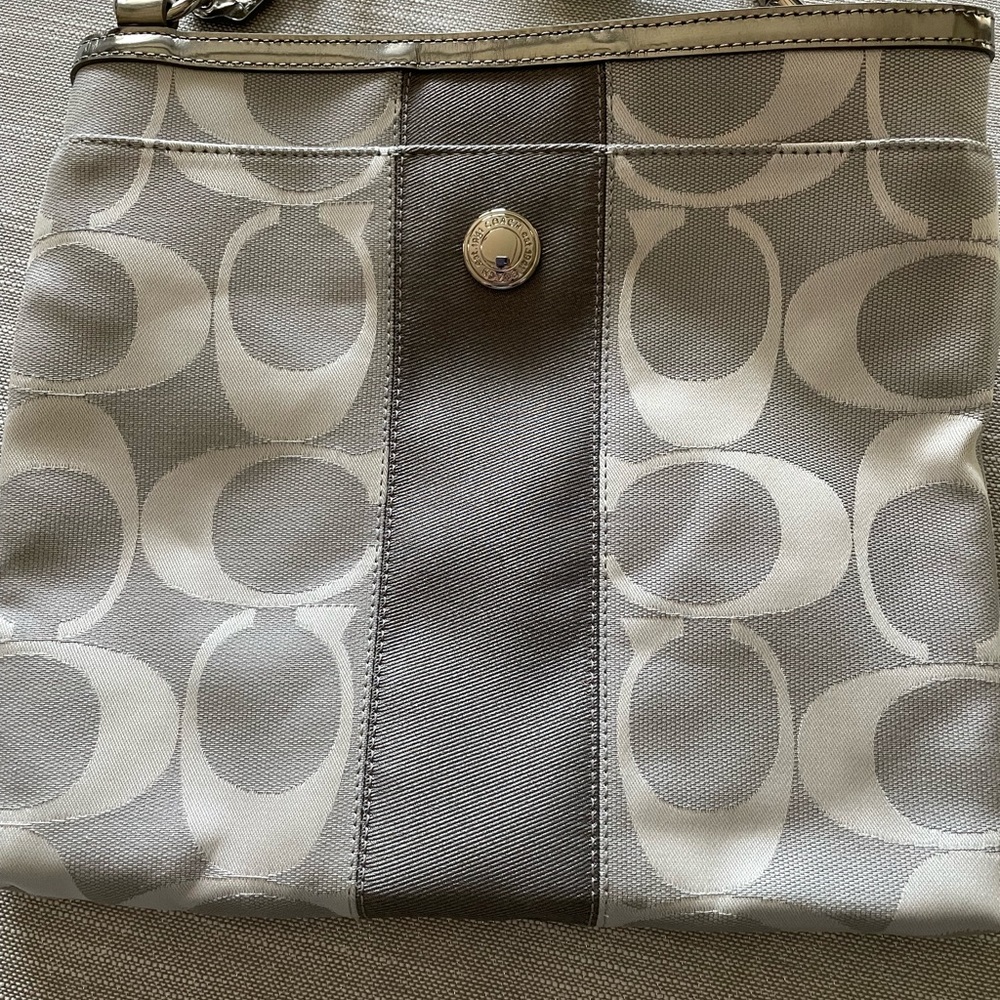 Gray, silver and white Coach crossbody bag new without tag.